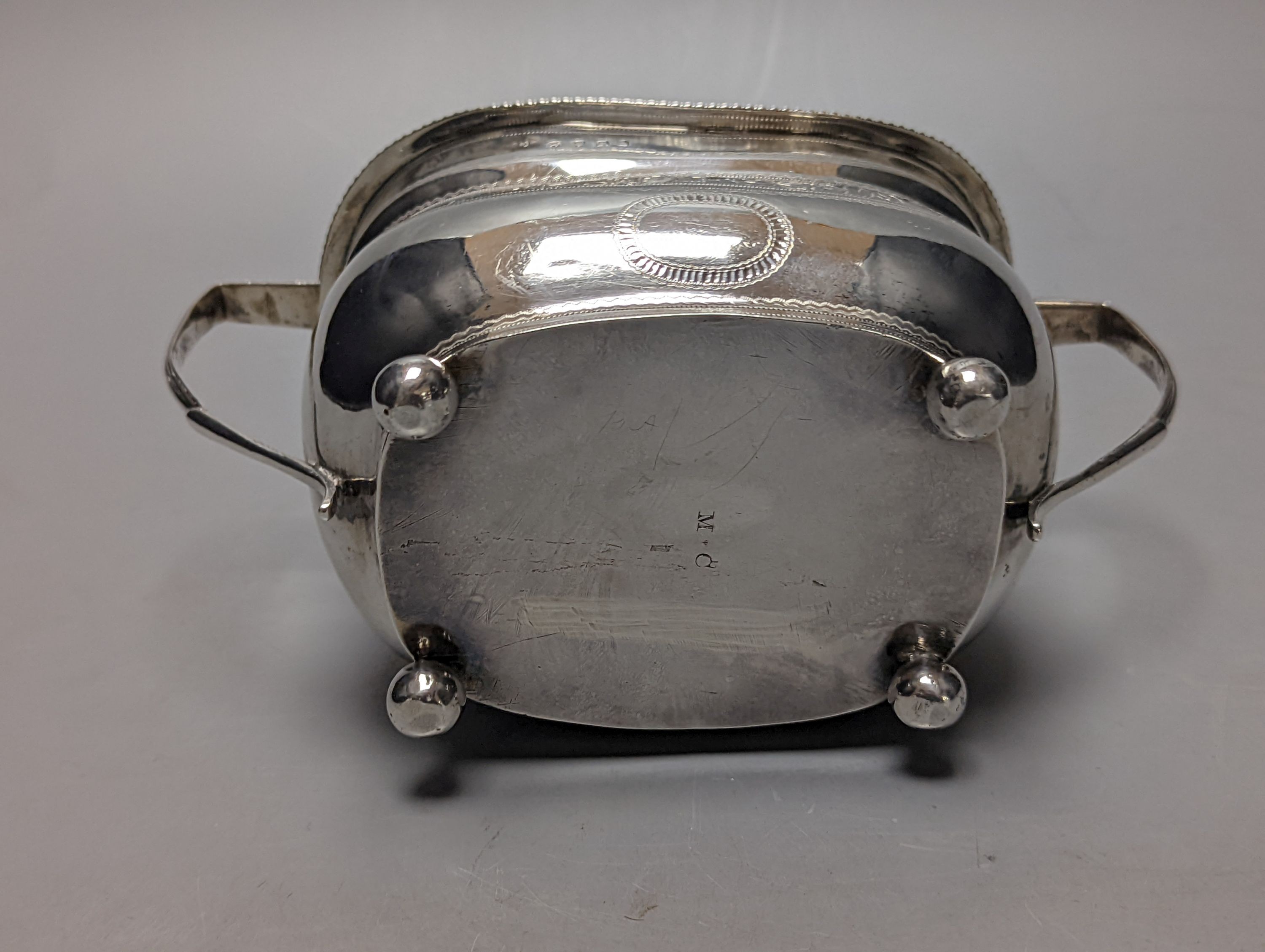 A George III engraved silver two handled sugar bowl, maker ?D, London, 1812, width 19cm